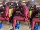 "eating both physical and spiritual food" – Nigerian man shamɘlessly devours vegetable soup and 'akpu' in church during the sermon (VIDEO)