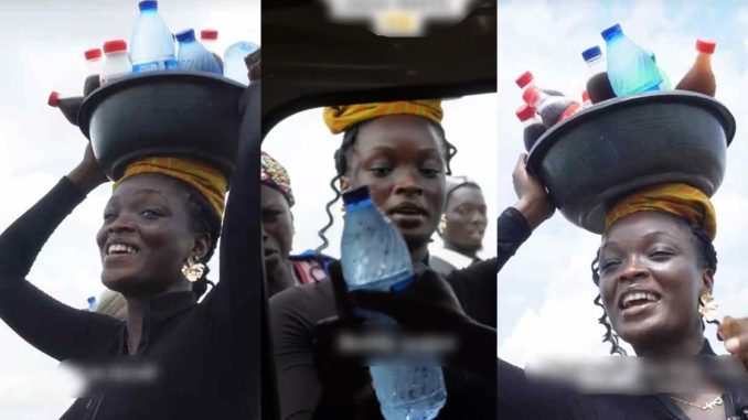 "A whole omo oba hawking pure water" – Nigerian mum fumɘs as she discover video of her daughter hawking soft drinks and water on the road (AUDIO)