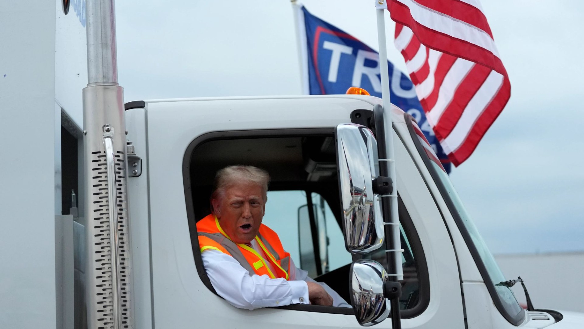 Donald Trump mocks Joe Biden’s ‘garbage’ comment gaffe as he rides in rubbish truck to Wisconsin rally