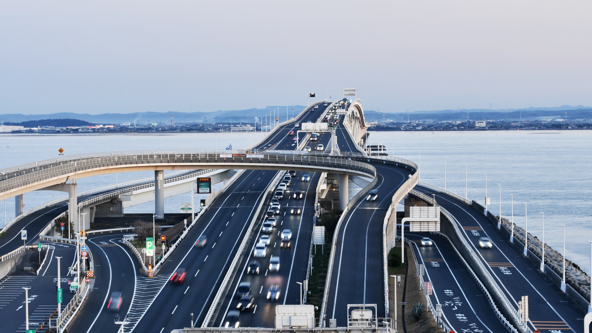 World’s first FLOATING car park accessible only by precarious sea bridge is SO bizarre it attracts throngs of tourists