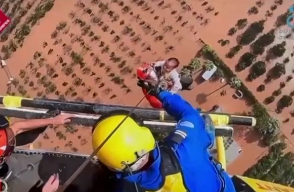 Shocking footage showed the moment a baby was saved from the catastrophic flash floods