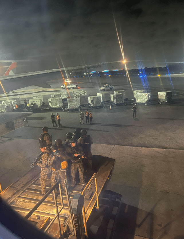 The SWAT team checked the hold for a person after the flight was turned around