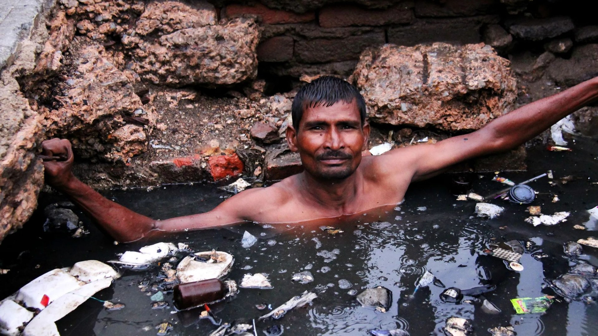 World’s ‘most dangerous job’ where workers battle snakes in poo-filled tunnels & life expectancy is just 40 – for £3 day