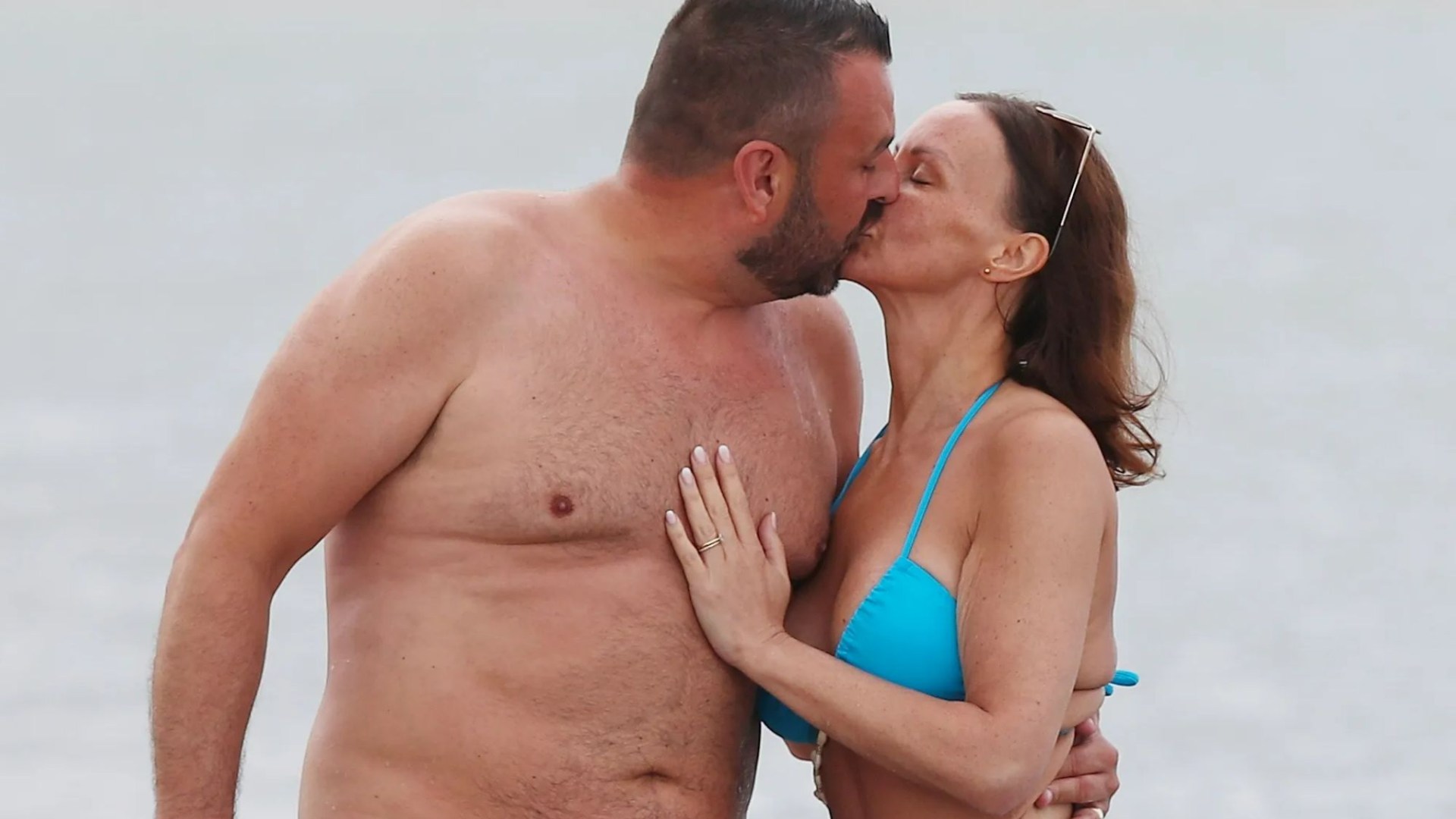 Chanelle Hayes looks loved up with new husband as they kiss in the sea on honeymoon in Greece