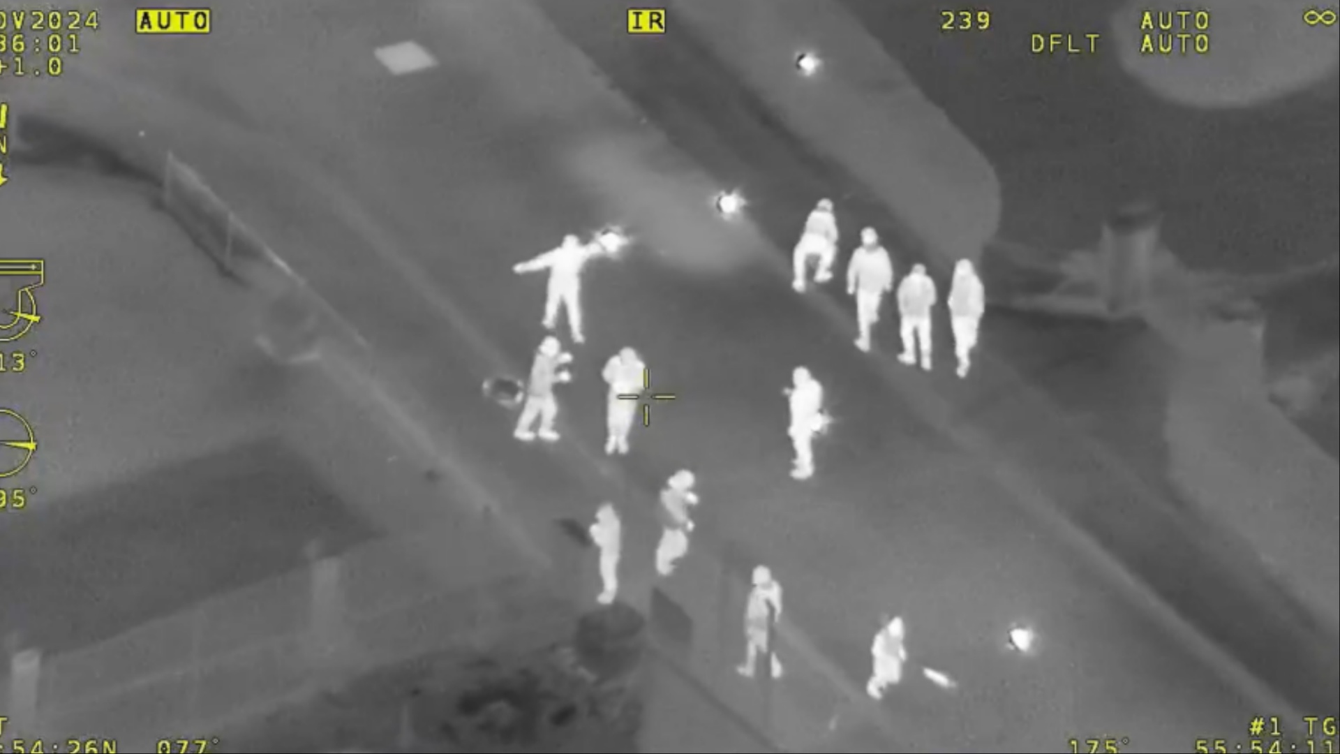 Bonfire Night carnage captured in police chopper night vision footage as gangs clash with riot cops