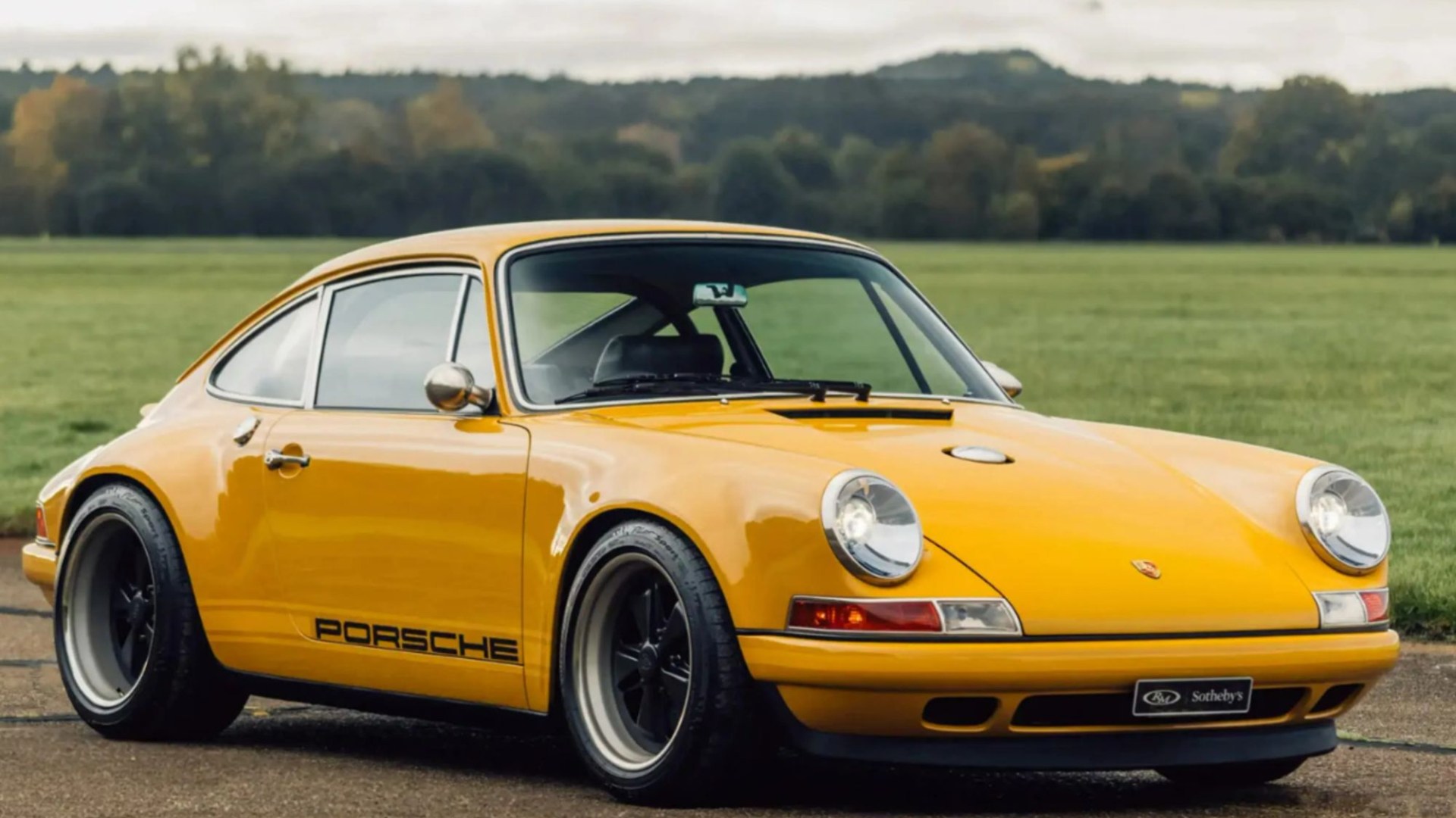 Iconic Porsche 911 in rare Egg Yolk yellow with black leather seats goes to auction - and it could be yours for £850k