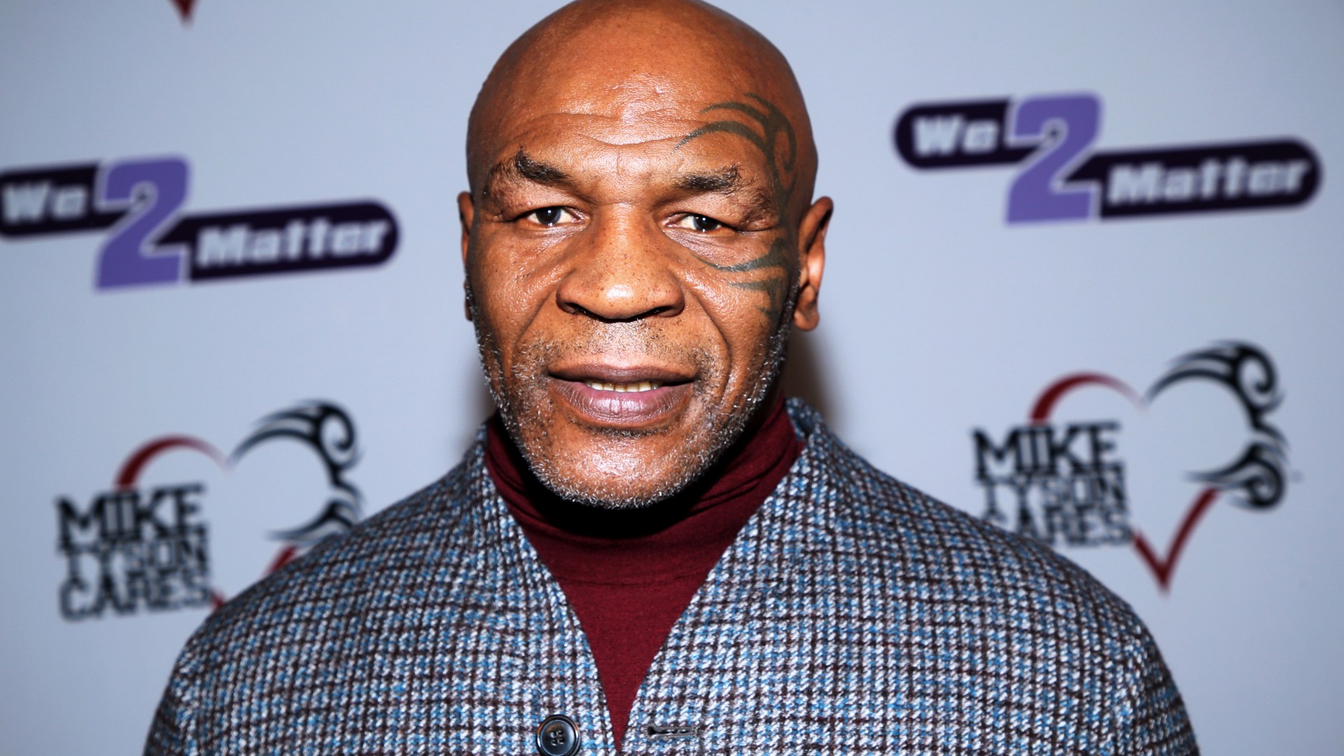 How many fights has Mike Tyson lost and what is the boxer's record in the ring?