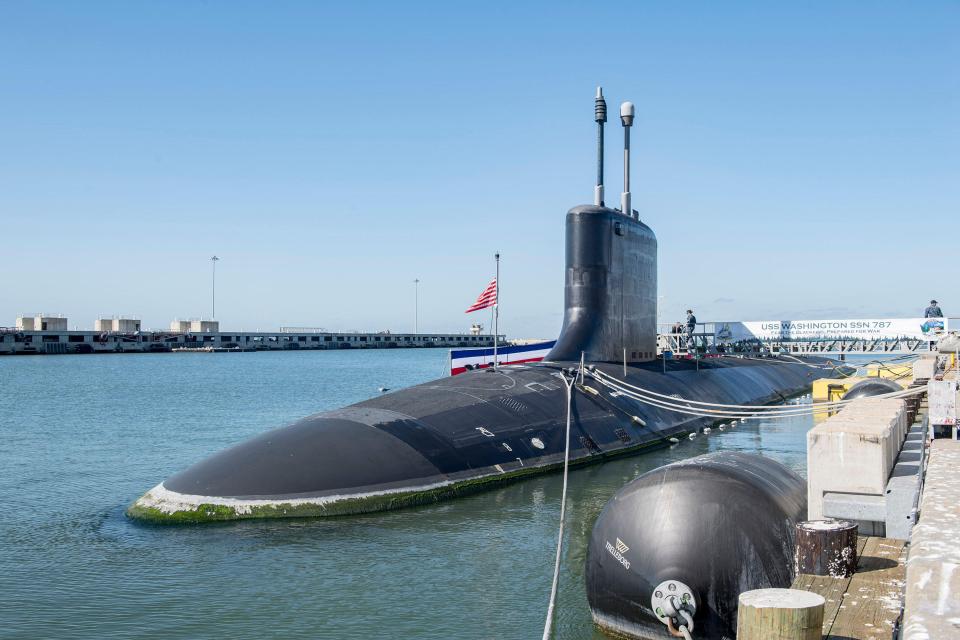 The young fishermen managed to snag the mammoth USS Virginia nuclear-powered sub