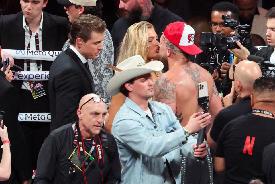 She gave him a congratulatory kiss after he won the fight