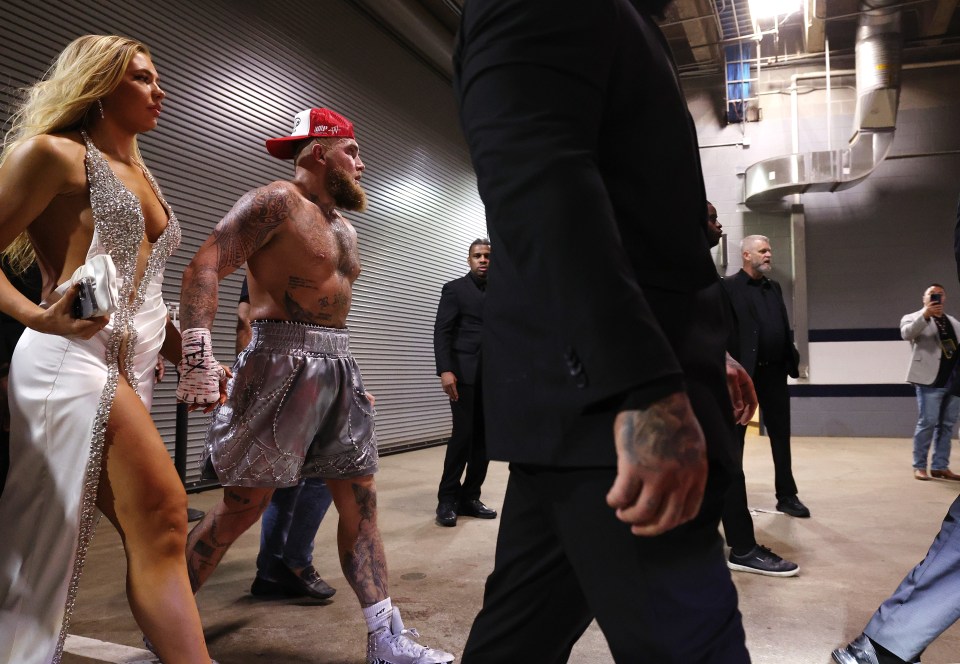 She accompanied him to the ring before the fight