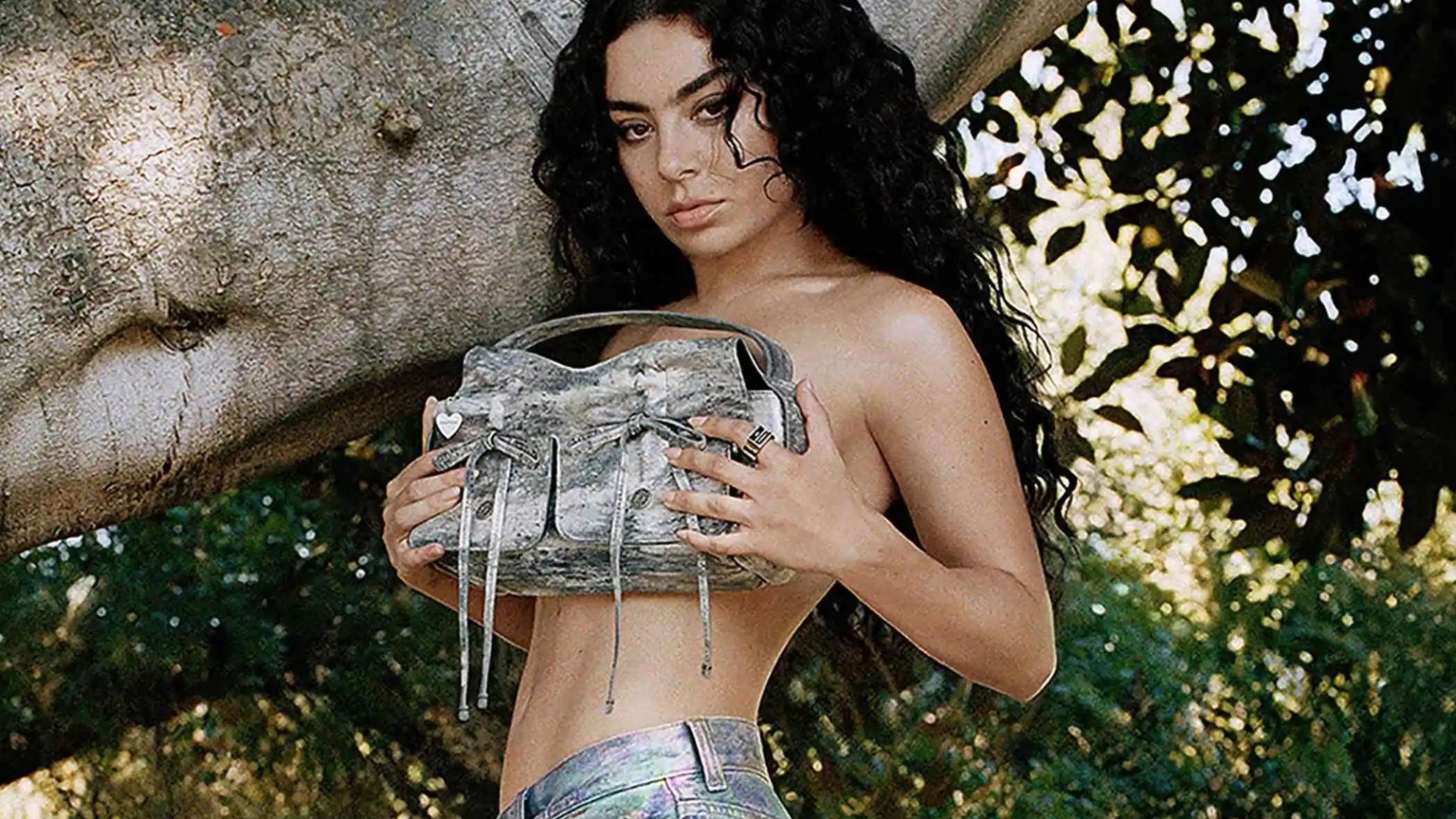 Charli XCX poses topless in sexy shoot following Saturday Night Live appearance