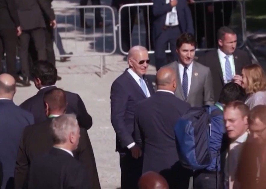 Biden appeared through palm trees with Canada's Justin Trudeau after the photo was taken