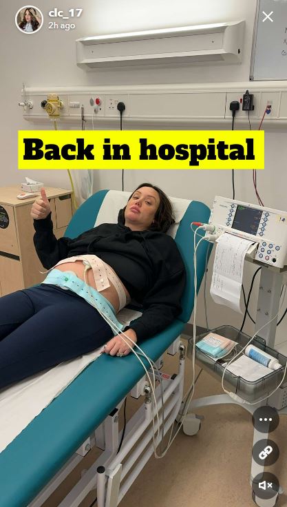 Charlotte shared a picture of her with a thumbs up in hospital