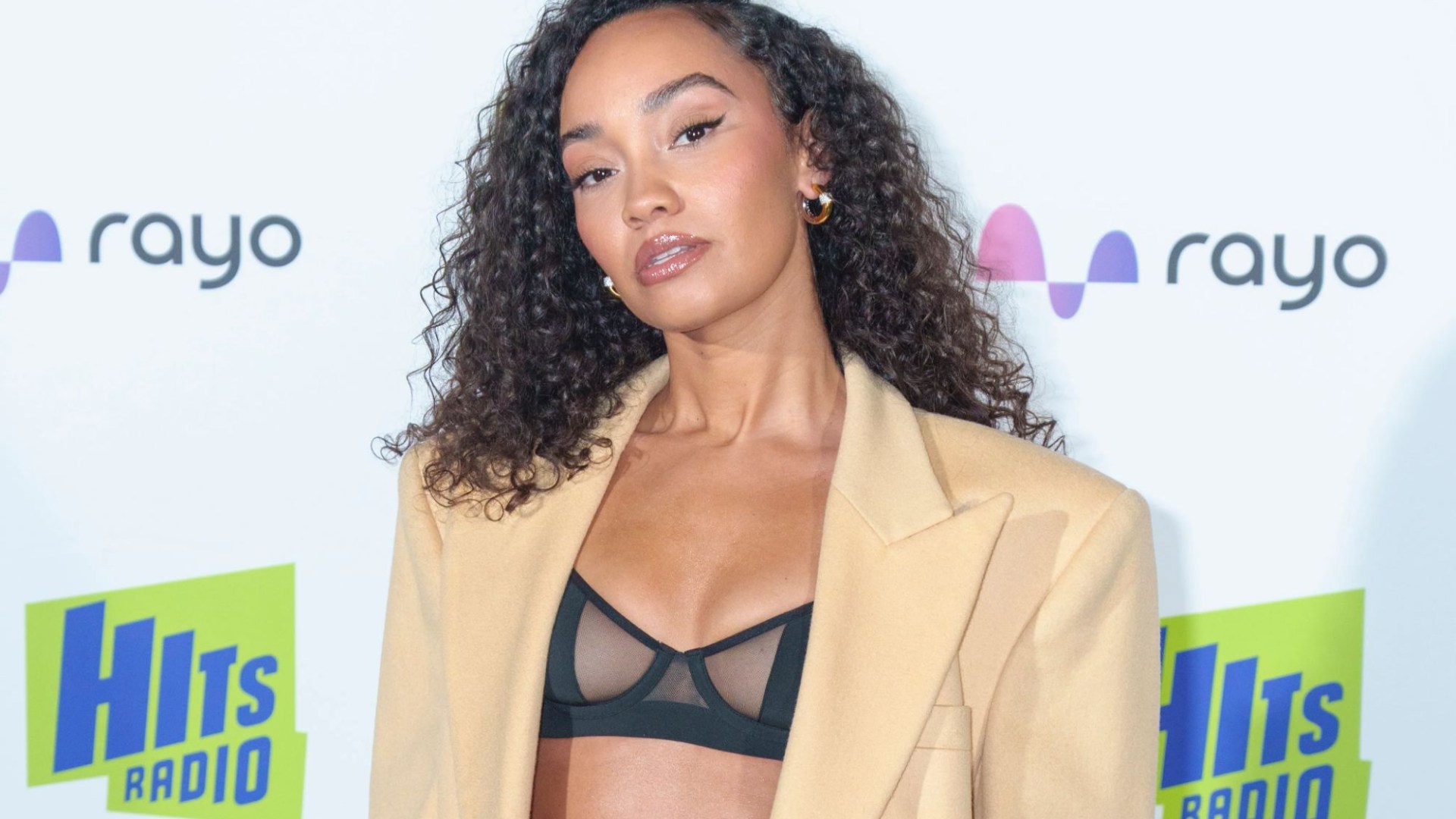 Former Little Mix star Leigh-Anne Pinnock wows in black mesh bra and cowboy-style legwear ahead of sell-out show