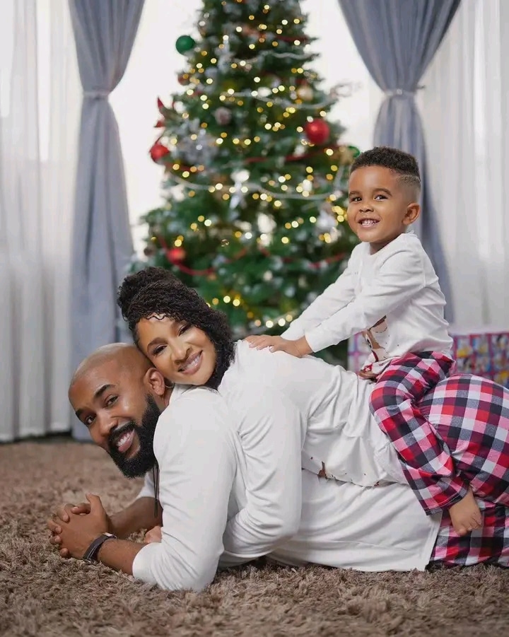 Banky Wellington, Adesua Etomi and their son.