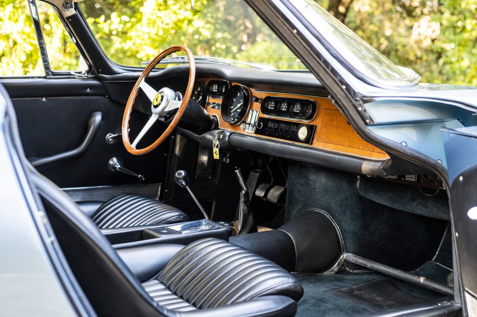 The motor comes with a sleek wooden panel interior and the iconic Ferrari badge on the wheel