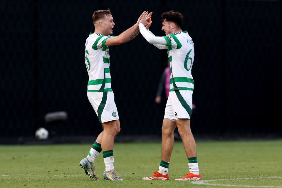 Daniel Cummings celebrates with teammate Rhys Dargie