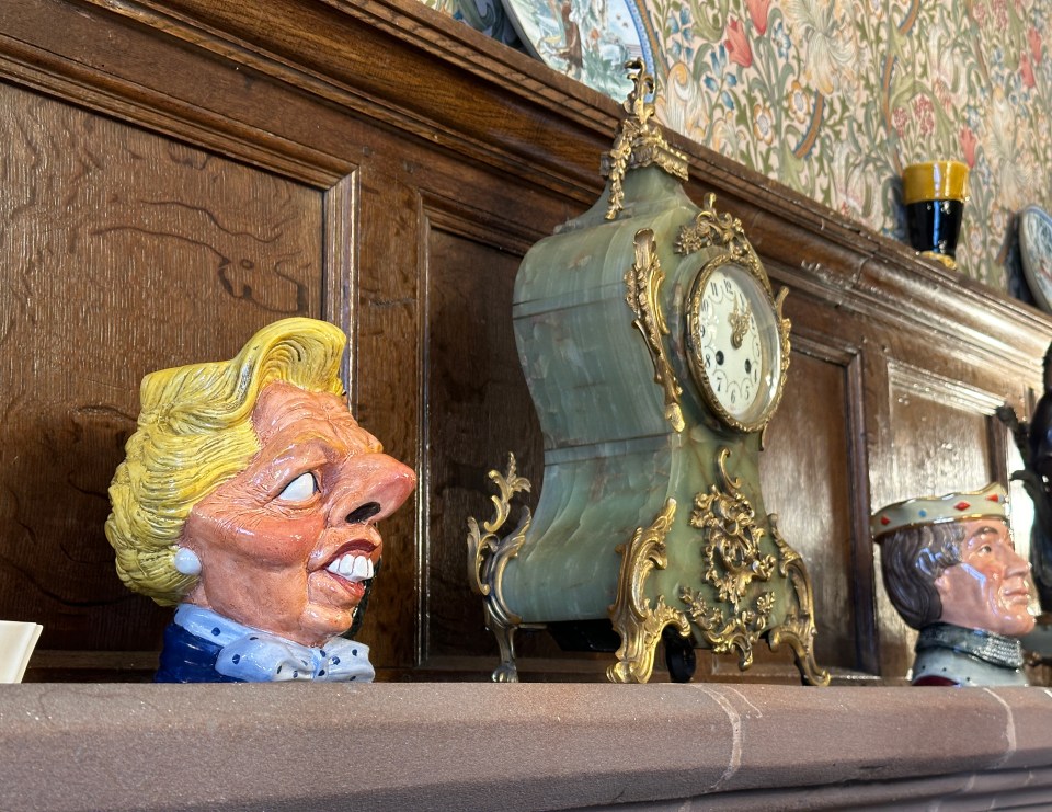 The house is full of trinkets, including this Toby Jug of Margaret Thatcher