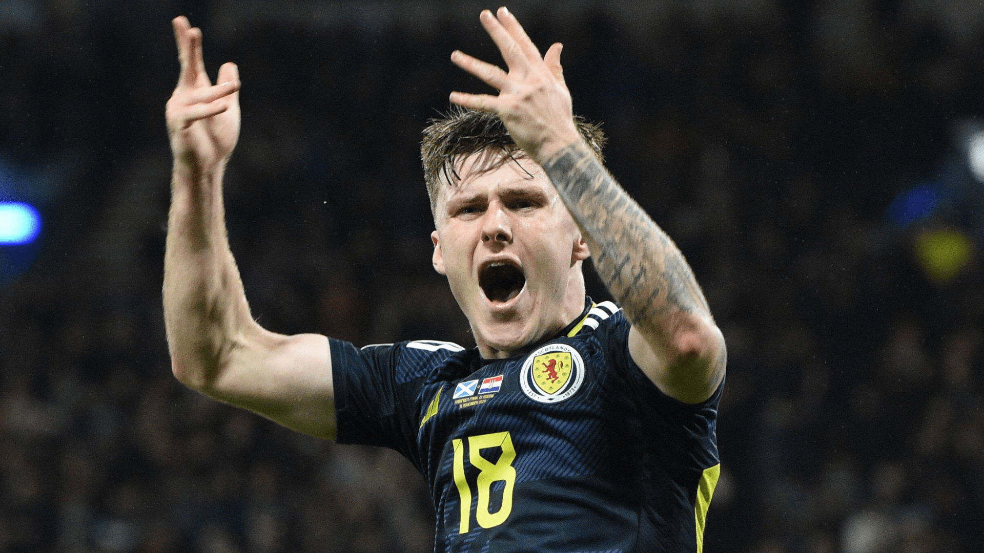 Buzzing Ben Doak reacts after hearing Scotland chant as Tartan Army embrace new hero with tune in Poland