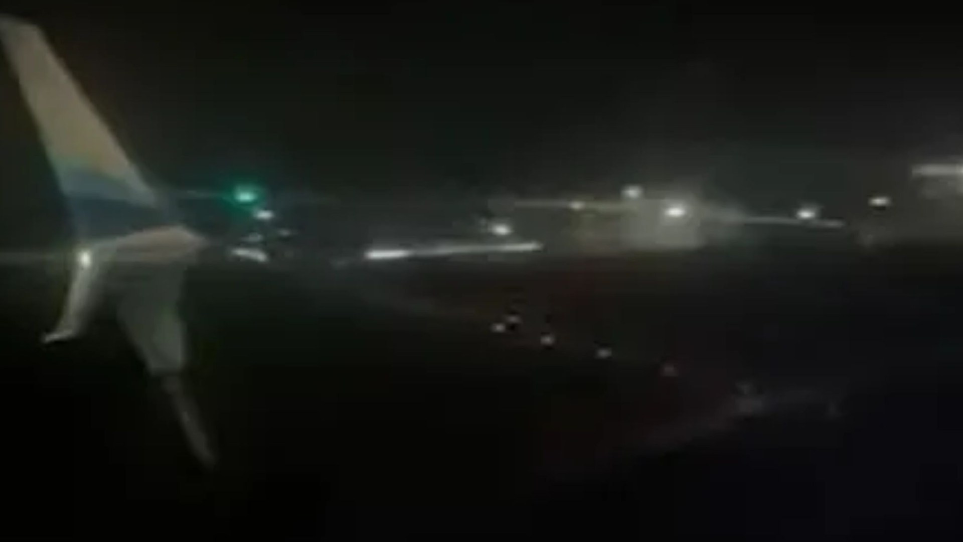 Moment loud bang 'violently rocks' plane as impact forces oxygen masks to drop & eerie passenger chants heard