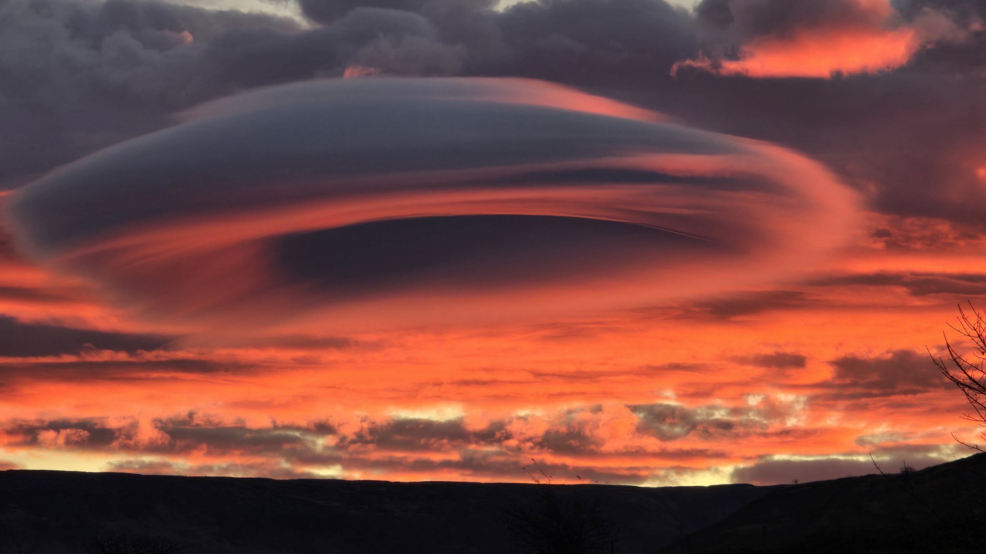 Eerie 'UFO cloud' shocks Brits as rare phenomenon lurks over UK town for 10 minutes before disappearing