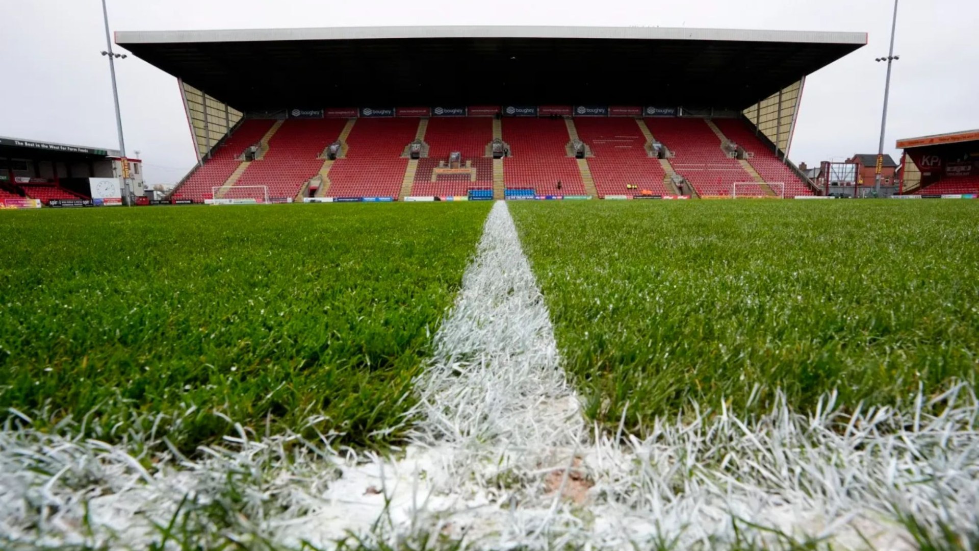 Inside EFL club's stadium with police-seized LED lights from cannabis factory helping maintain pitch