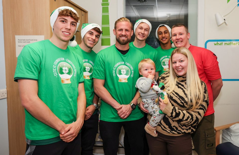 Engels, Bernardo, Schmeichel, Sinisalo and Idah with Able McDonald, aged 11 months, and parents Lee McDonald and Taylor Burke