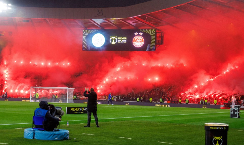 The stadium was engulfed in smoke and kick-off was delayed