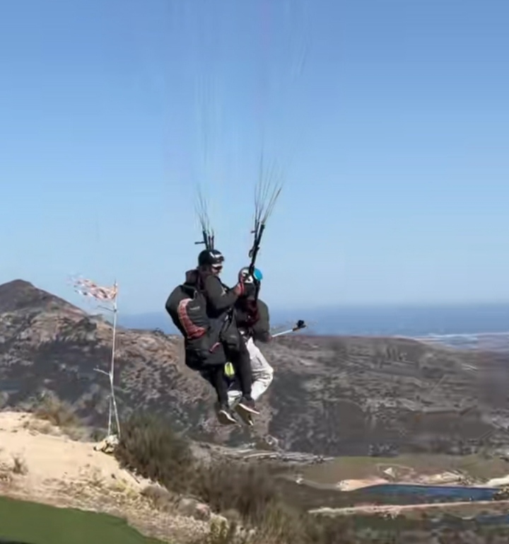 Lady shares dad's hilarious reaction to her paragliding video