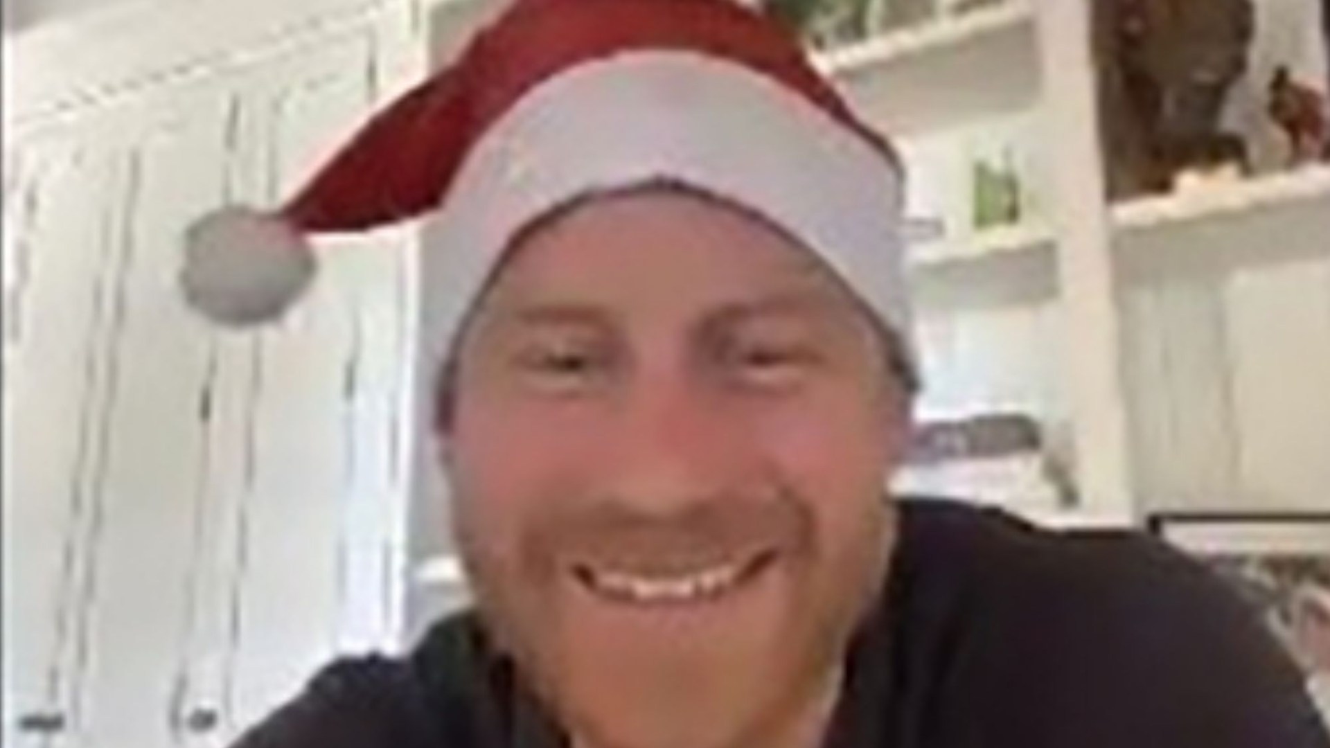 Prince Harry says 'it's OK to feel sad at Christmas' as he joins party in Santa hat without Meghan Markle