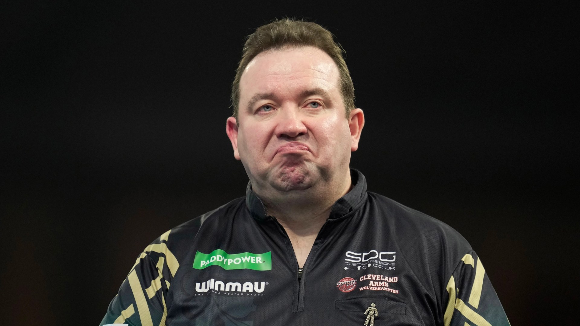 Who is Irish darts star Brendan Dolan?