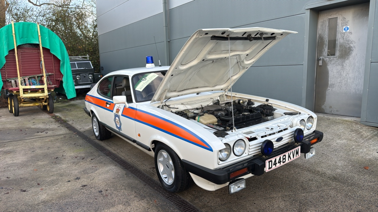 Classic 80s Ford cop car that took Moors killer to find victims sells for £22k