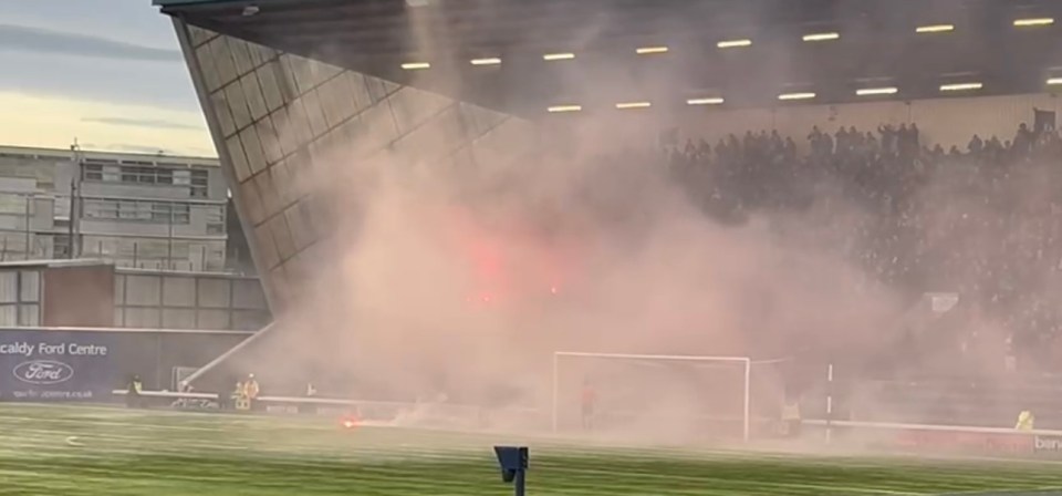 And smoke filled the stand as they burnt out