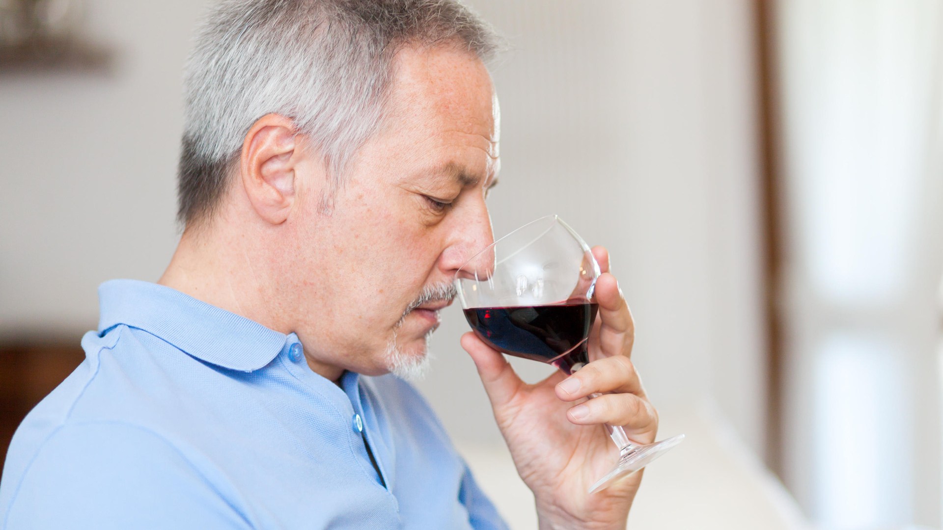 Drinking wine could slash your risk of heart disease by 50% - but there's a catch