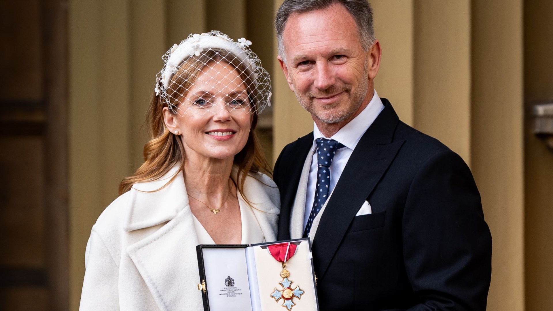 F1 boss Christian Horner puts year from hell behind him as he collects CBE with wife Geri by his side