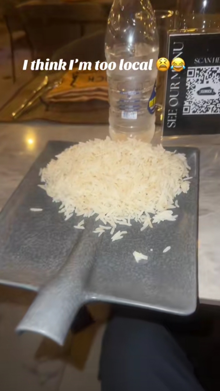 Man surprised after being served plate of rice on shovel at a restaurant 