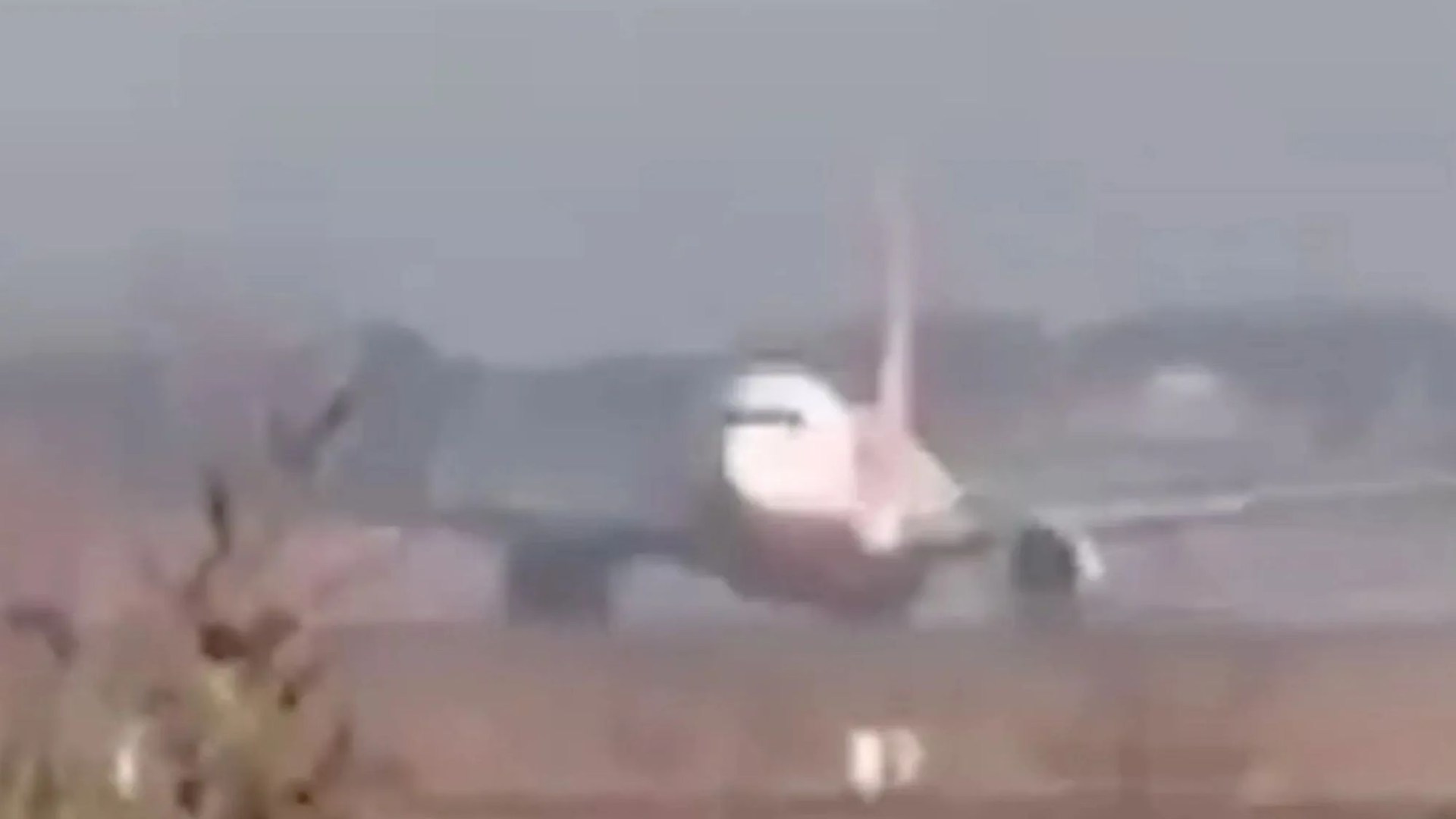 Terrifying footage shows doomed plane hurtling head on to concrete wall before bursting into flames killing 179 onboard