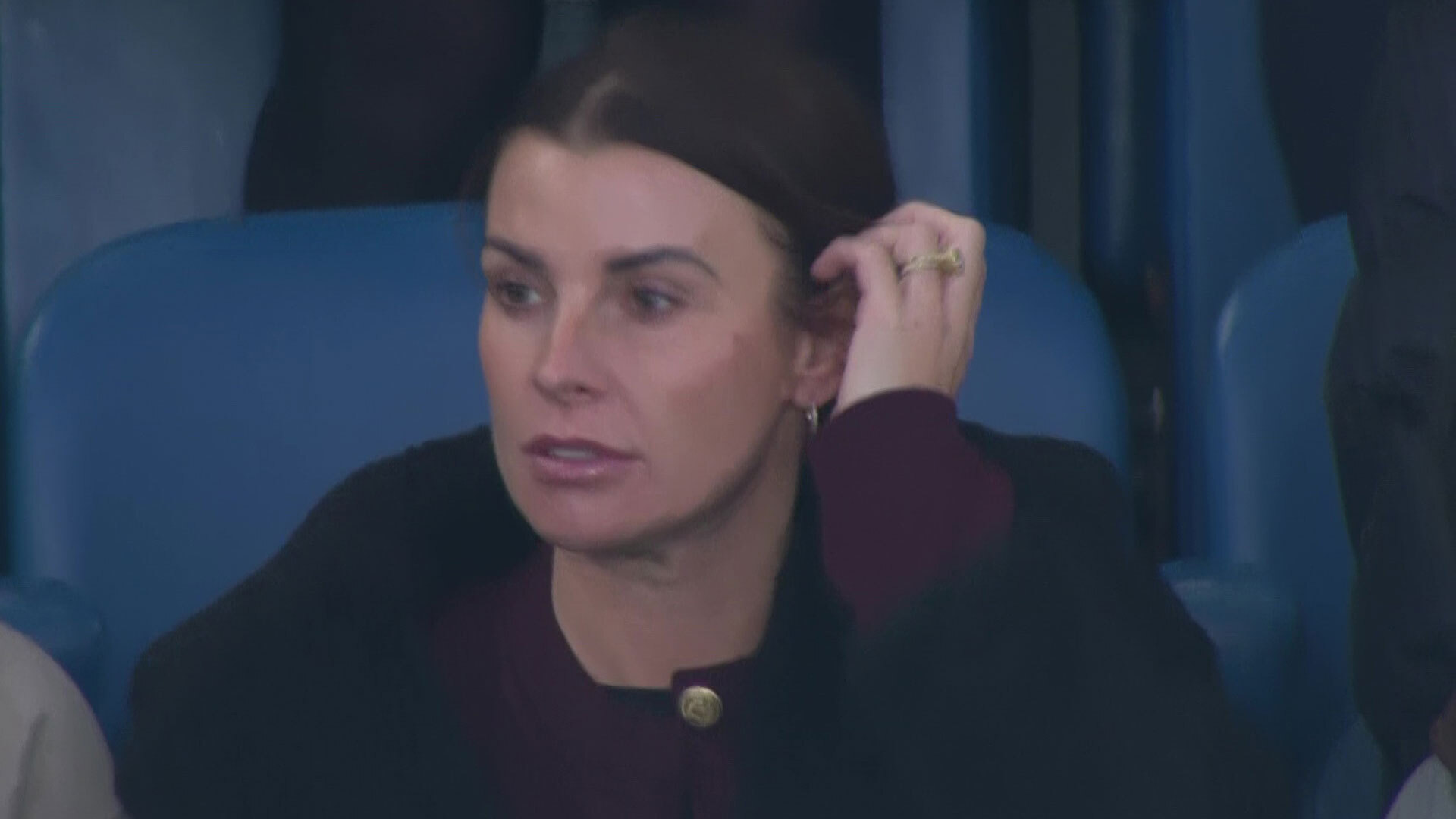 Coleen Rooney looks unimpressed as she watches on during Everton defeat with husband Wayne on brink of sack