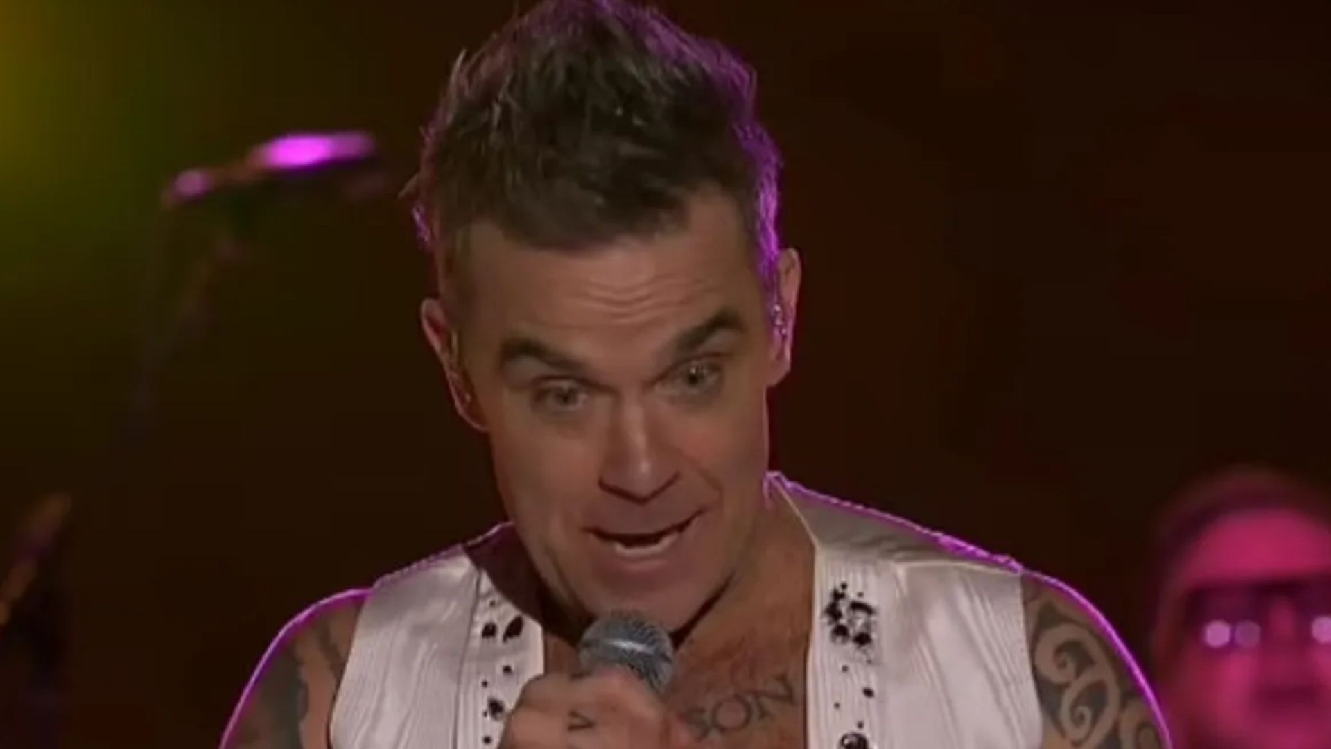 Watch awkward moment Robbie Williams calls out audience member during NYE gig in Australia