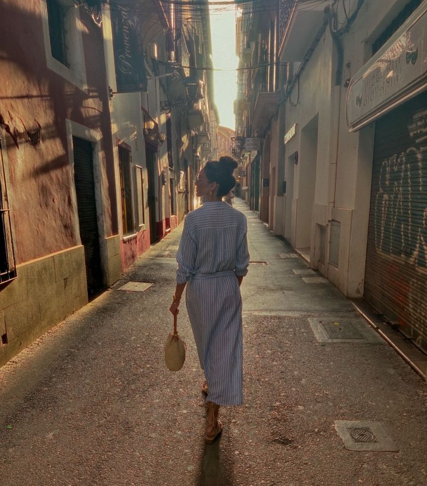 Michelle pictured on the holiday where she took the snaps, exploring the local Spanish streets