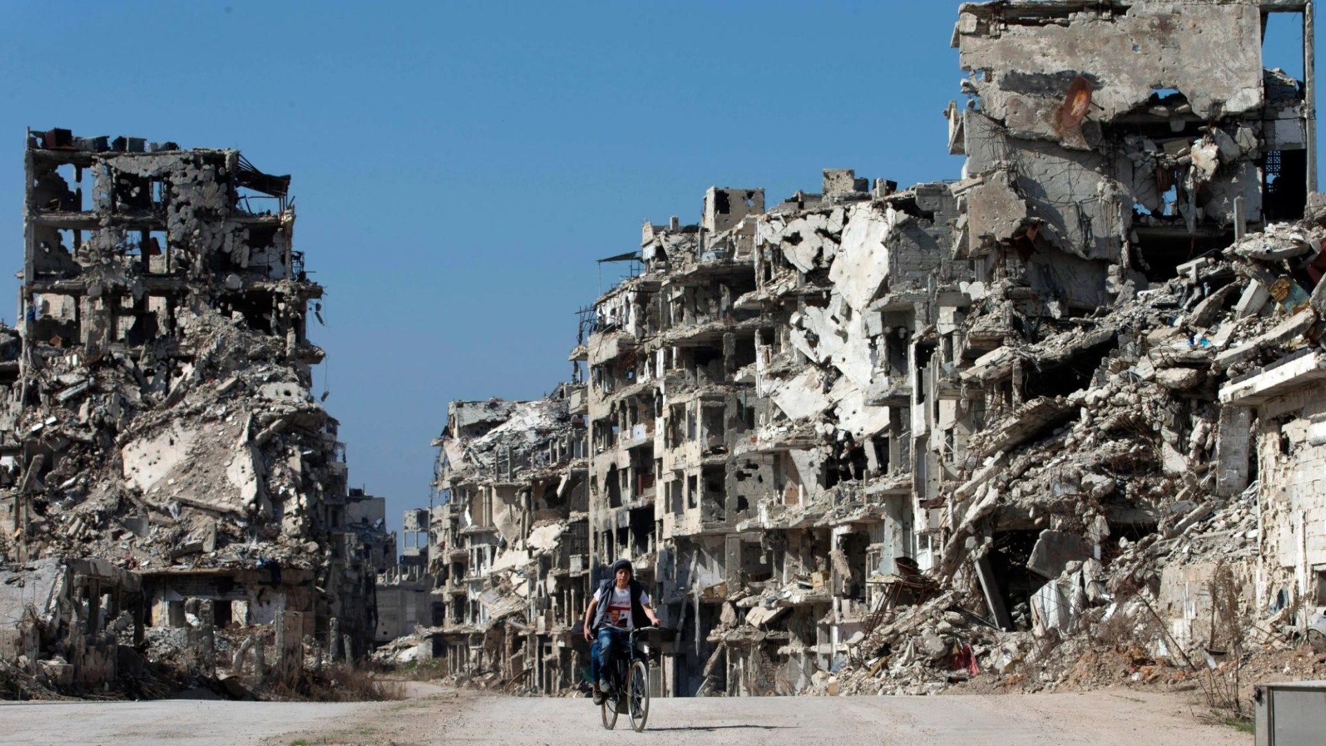 Syrians return to Homs - hellish hub for Assad's most evil war crimes with years of massacre, starvation, rape & torture