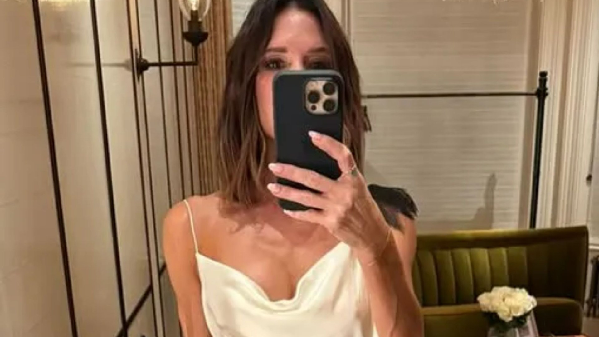 Victoria Beckham looks incredible in £2000 silk dress from her own collection