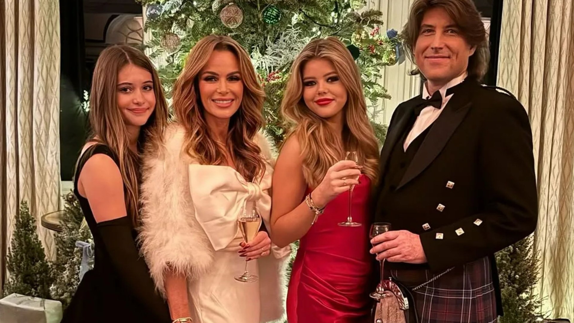 Amanda Holden looks incredible as she glams up with lookalike daughters to celebrate New Year