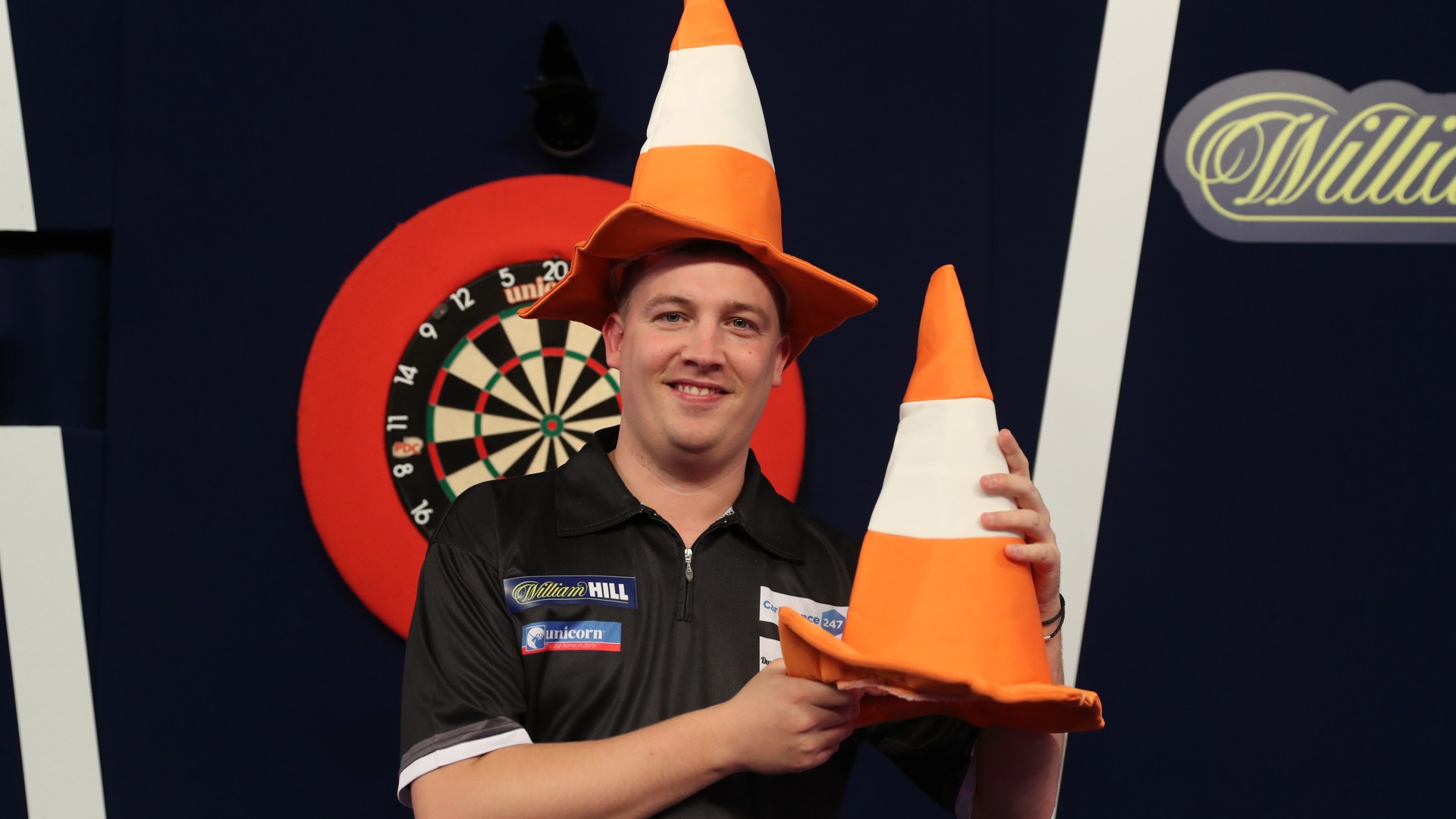 I'm guaranteed £100,000 at World Darts Championship but I miss the craic of my old job placing traffic cones on motorway