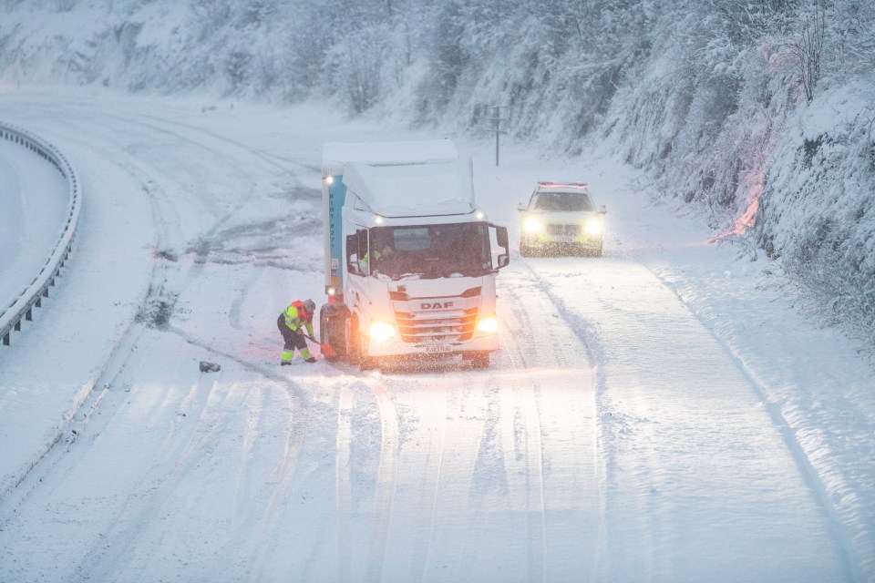 A lorry is pictured in County Durham blocking the A1 Southbound after getting stuck in heavy snow this morning