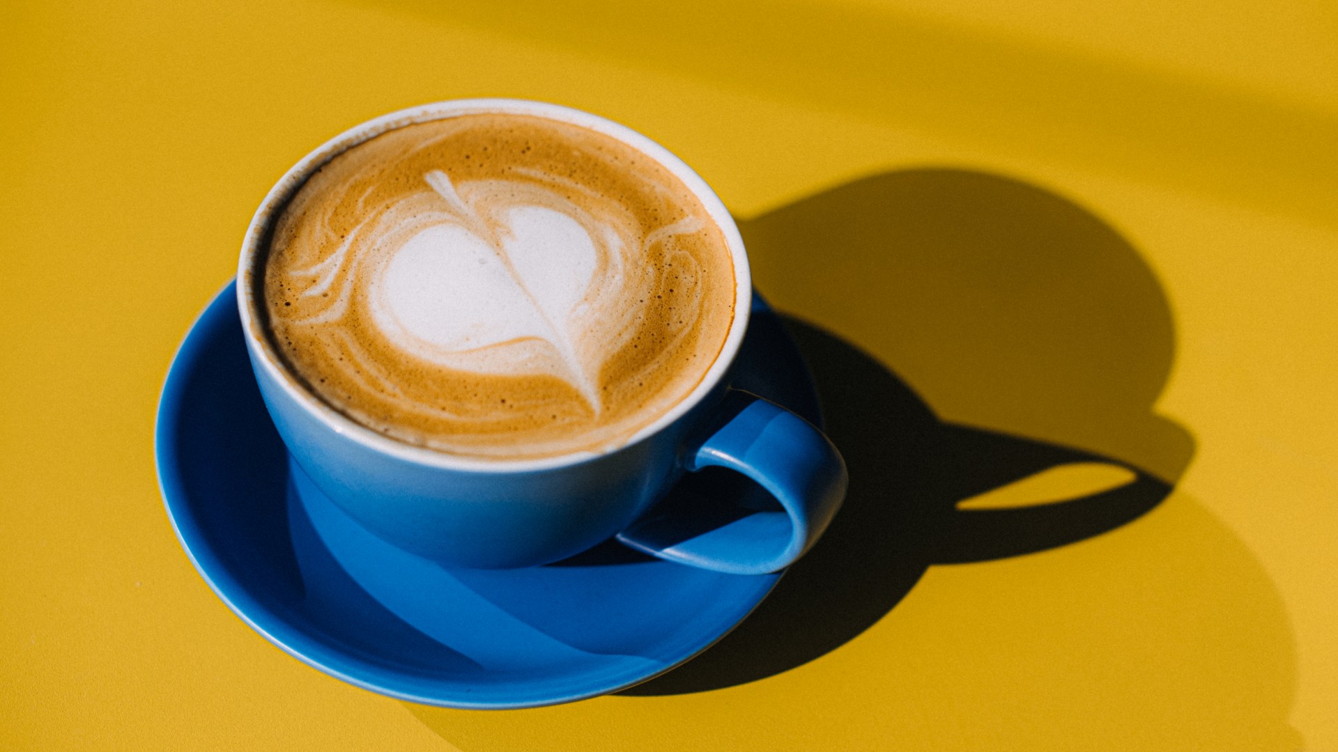 Coffee CAN protect against deadly heart disease - but the time of day is important, study says