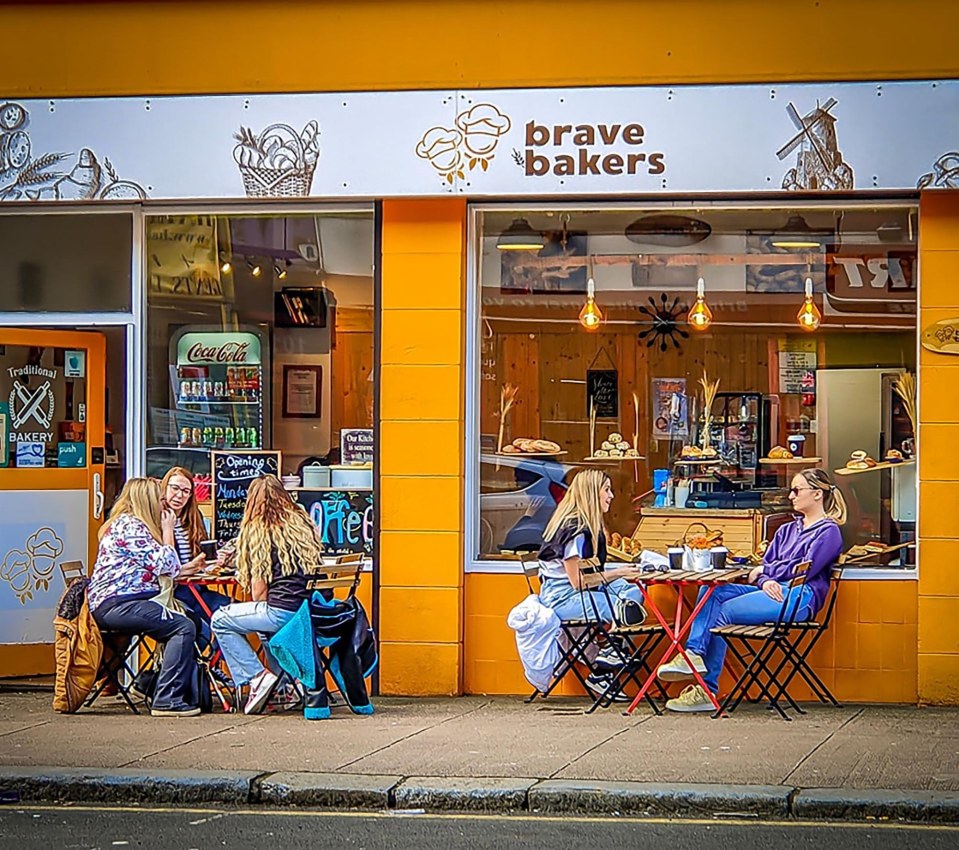 Brave Bakers bakery exterior with customers sitting outside.