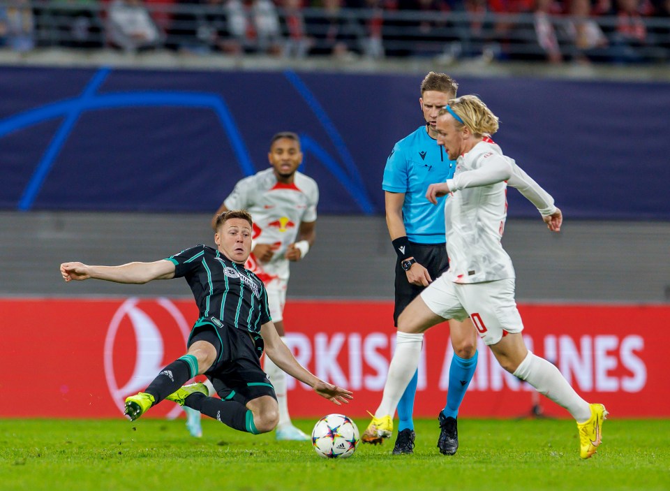 Soccer players vying for the ball during a match.