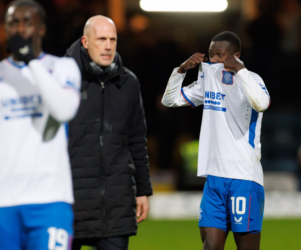 Mohamed Diomande of Rangers F.C. at full time, holding his jersey.