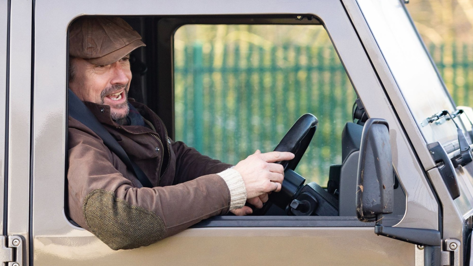 Richard Hammond beams in his Land Rover on a ride out after announcing his marriage split from wife of 23 years